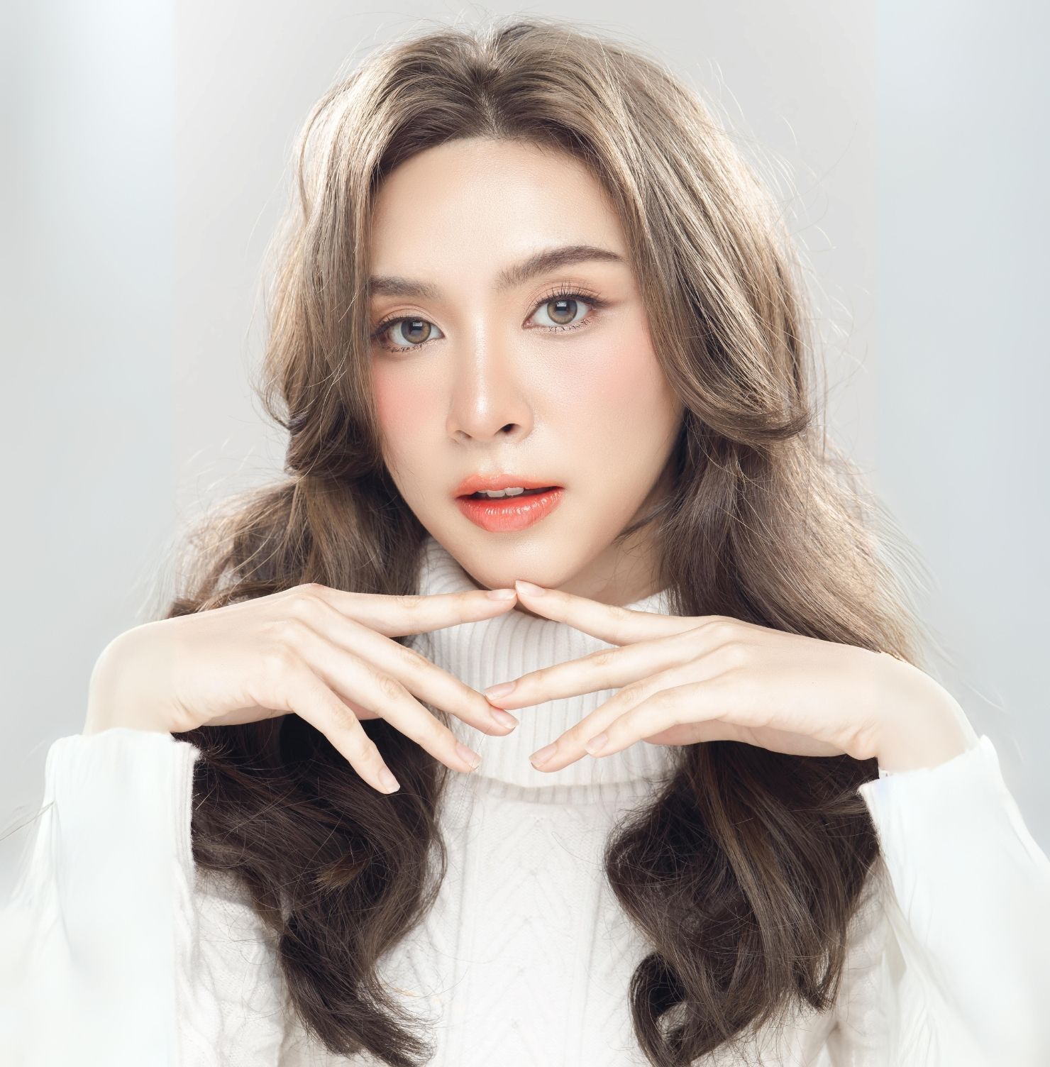 Tóc layer nữ cho mặt dài có mái bay