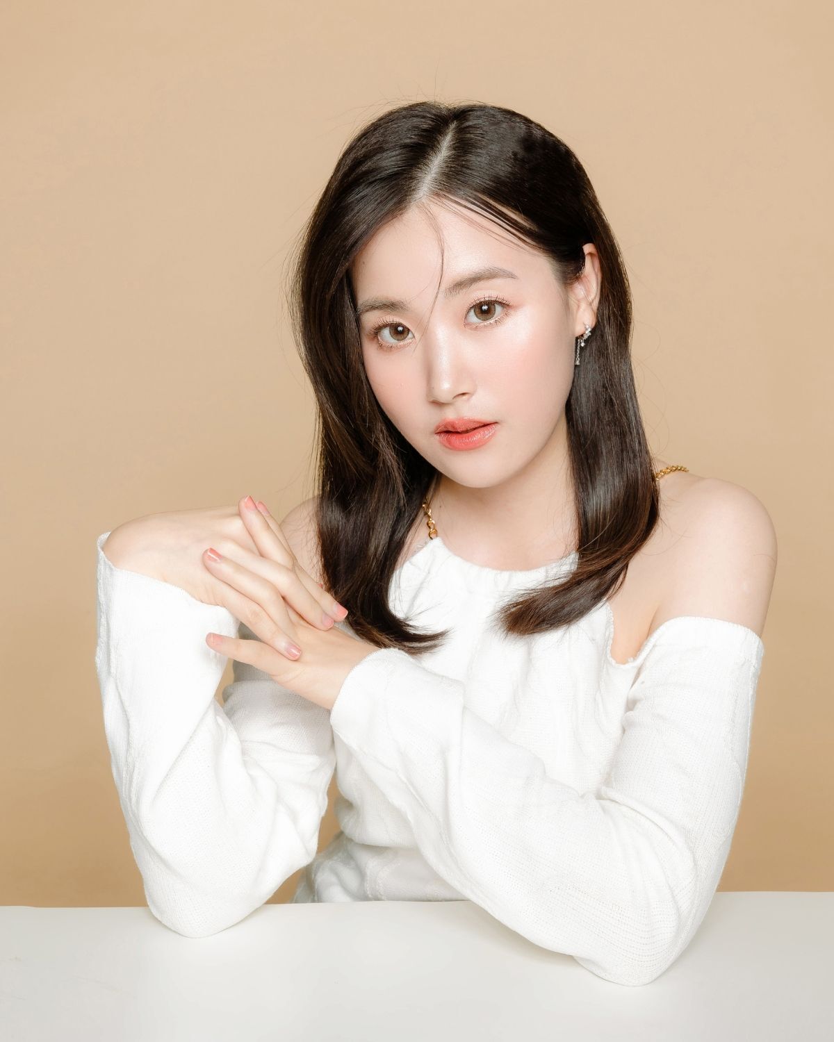 Tóc tỉa layer nữ uốn đuôi chữ C