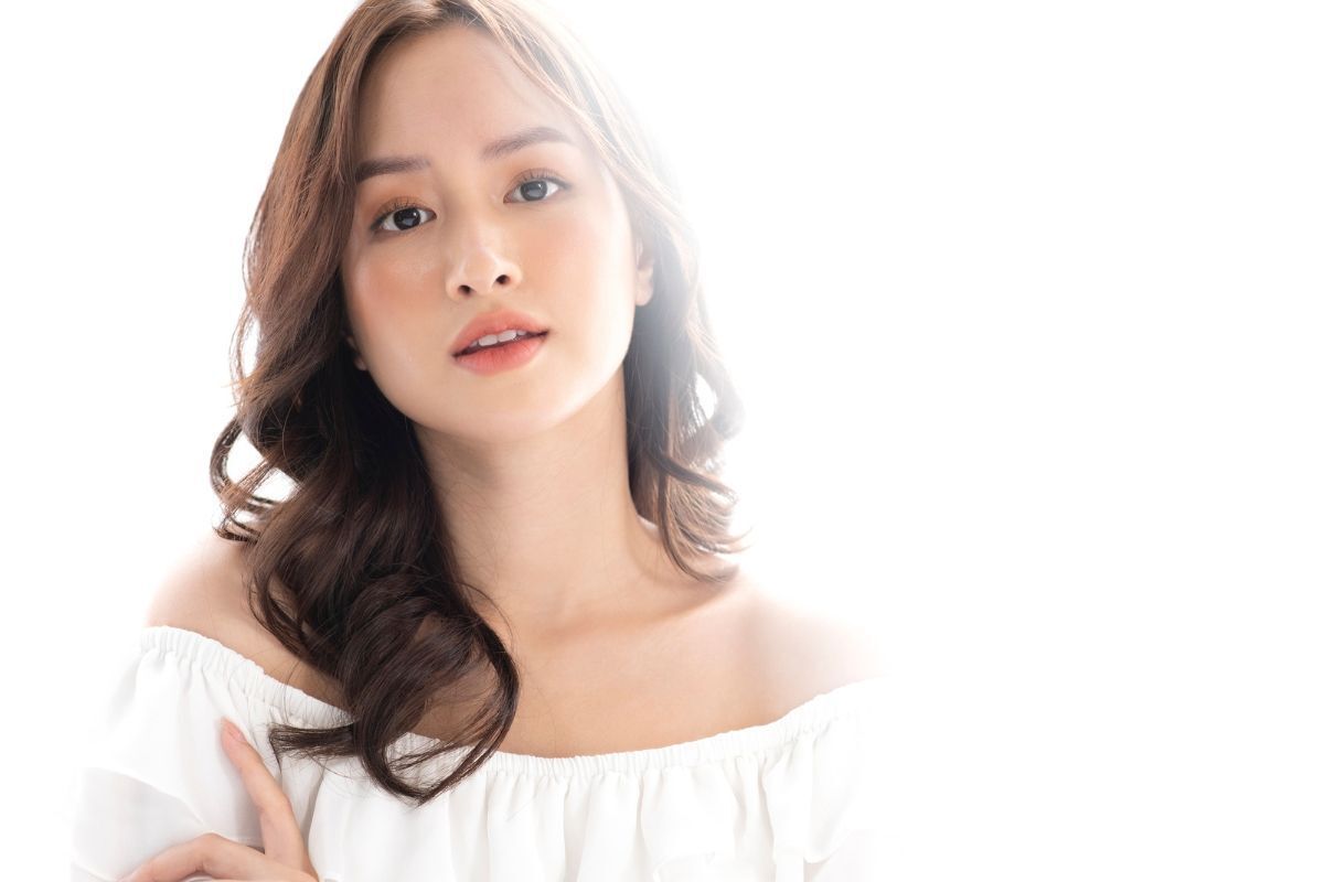 Tóc layer nữ dài uốn đuôi