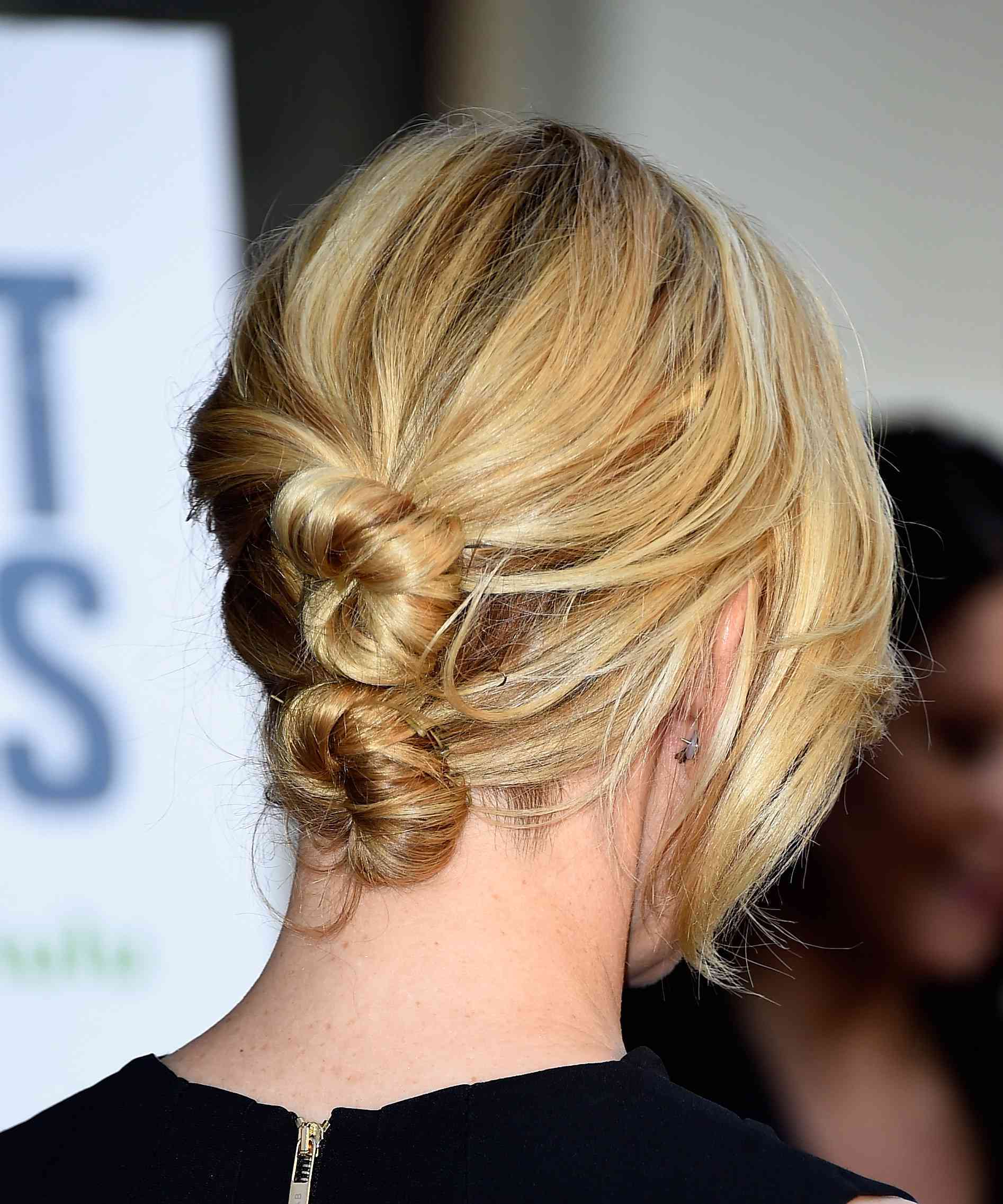 Coba gaya cepol yang berbeda dengan double chignon. (Foto: Byrdie)