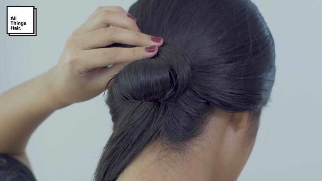 Step 9 sleek low knot- Anna Oktarina.
