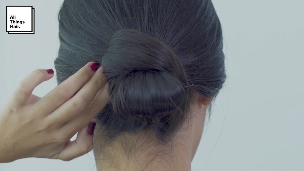 Sleek low knot a la Anna Oktarina.