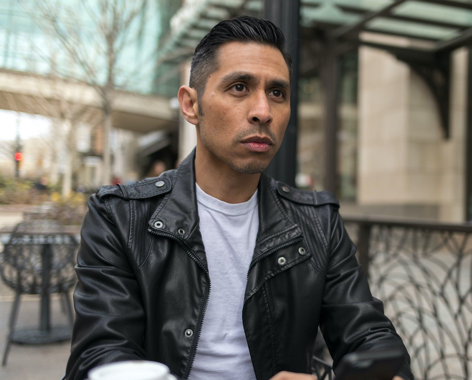 Hispanic man in city