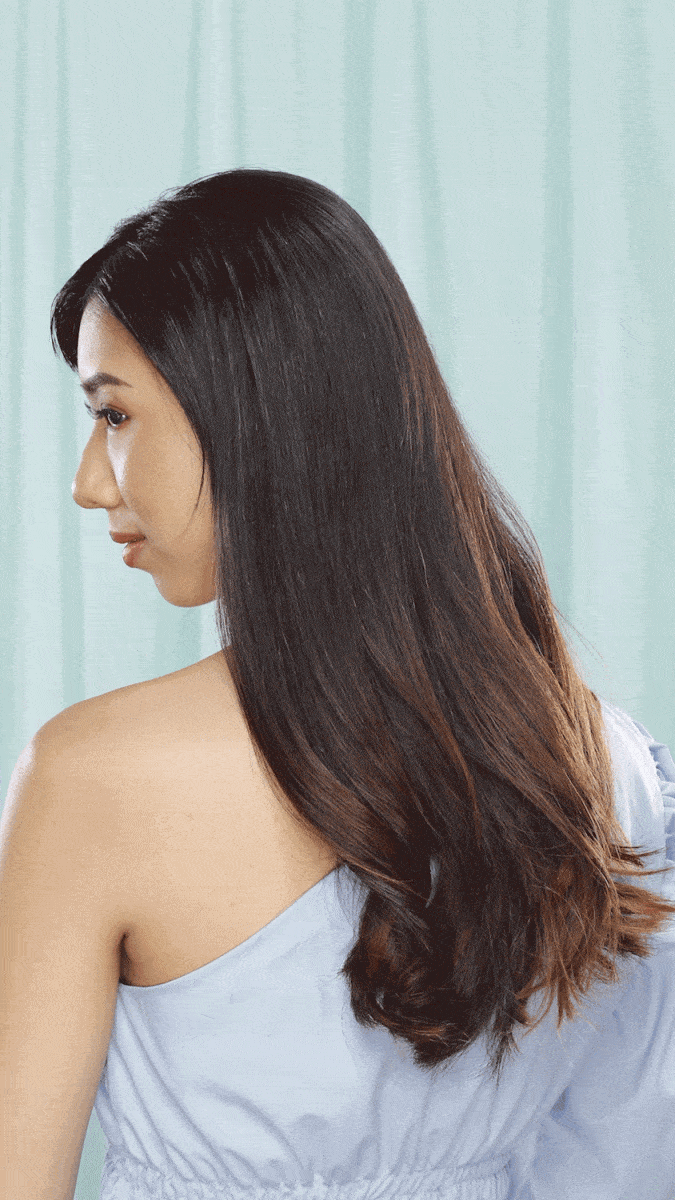 Wanita asia dengan gaya rambut korean waves