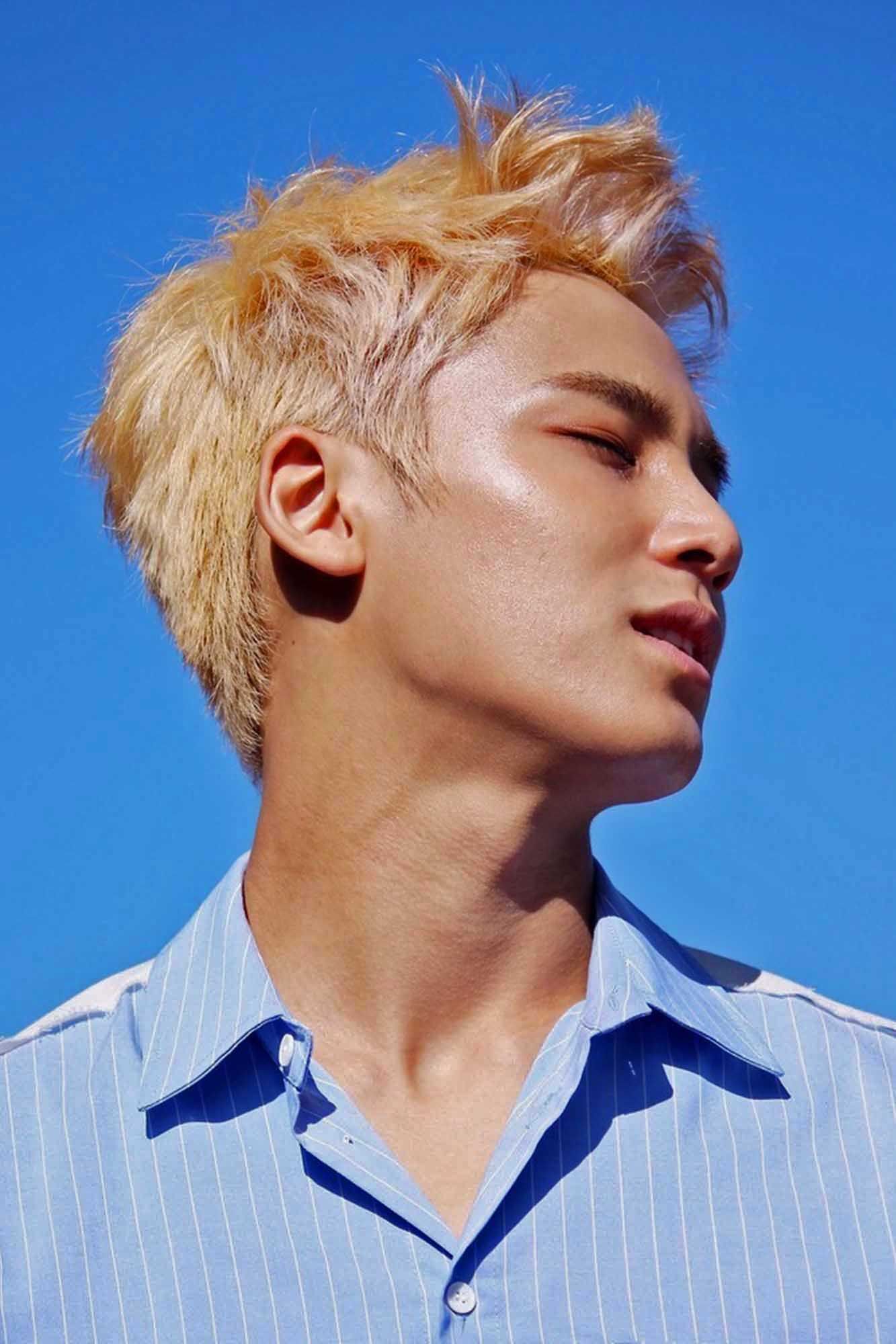 Mingyu dari SEVENTEEN memang terkenal dengan warna kulit yang gelap. (Foto: Pledis Entertainment)
