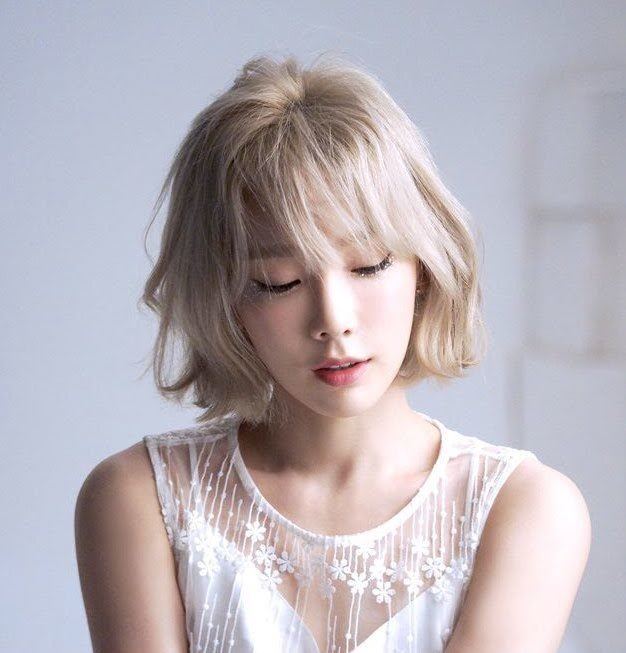 Model rambut wavy bob dengan poni. (Foto: Kprofile.com)