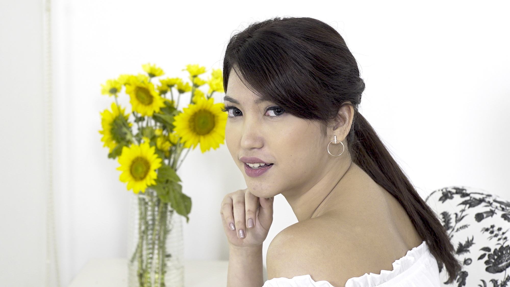 Gaya rambut twisted ponytail by Dewi Paramita.