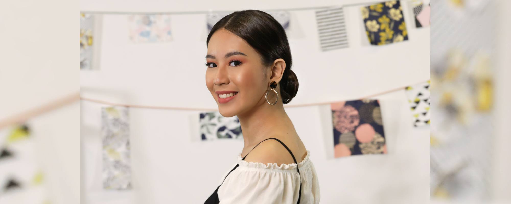 Wanita Asia dengan model rambut sanggul cepol rendah.