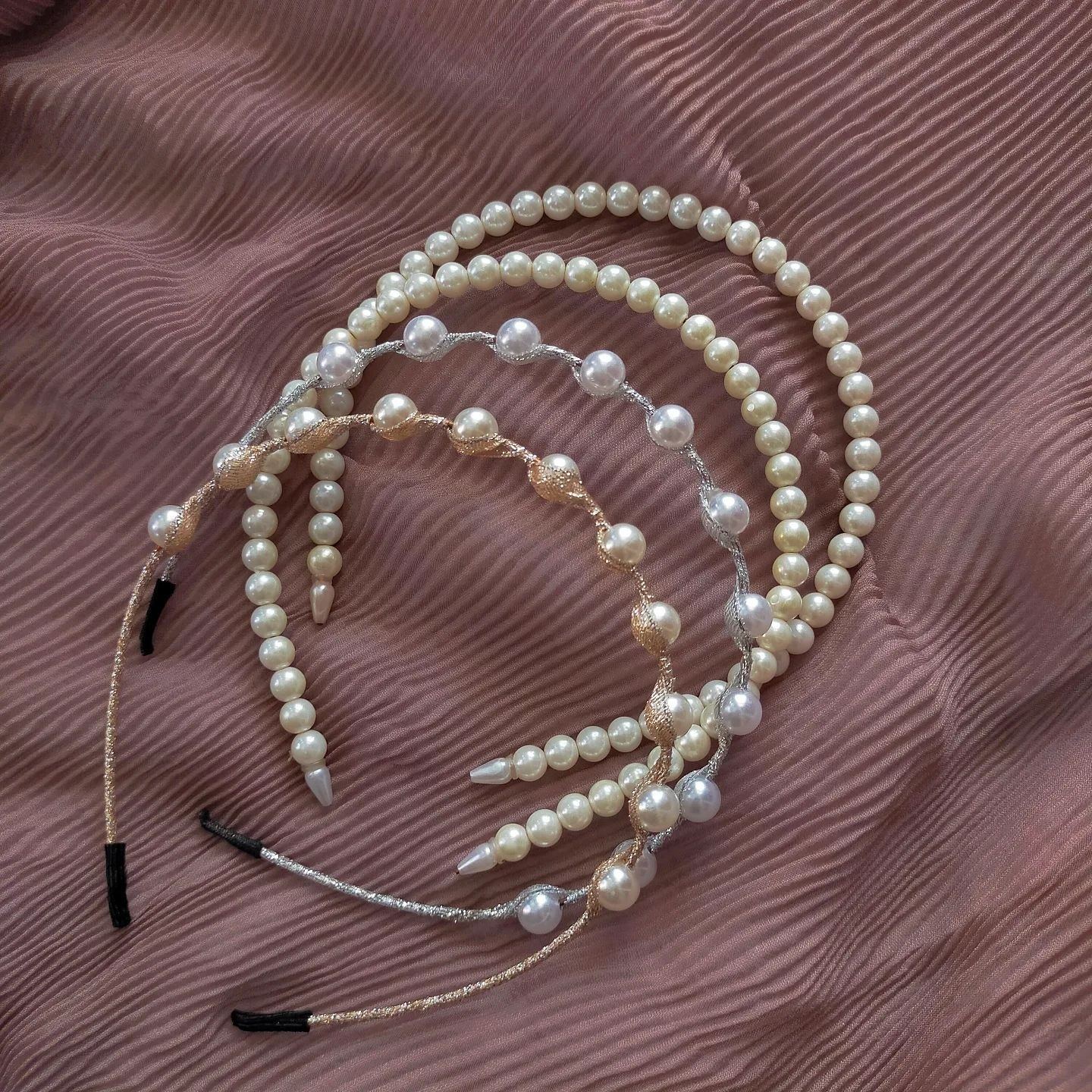 Bando atau aksesori rambut wanita bentuk mutiara