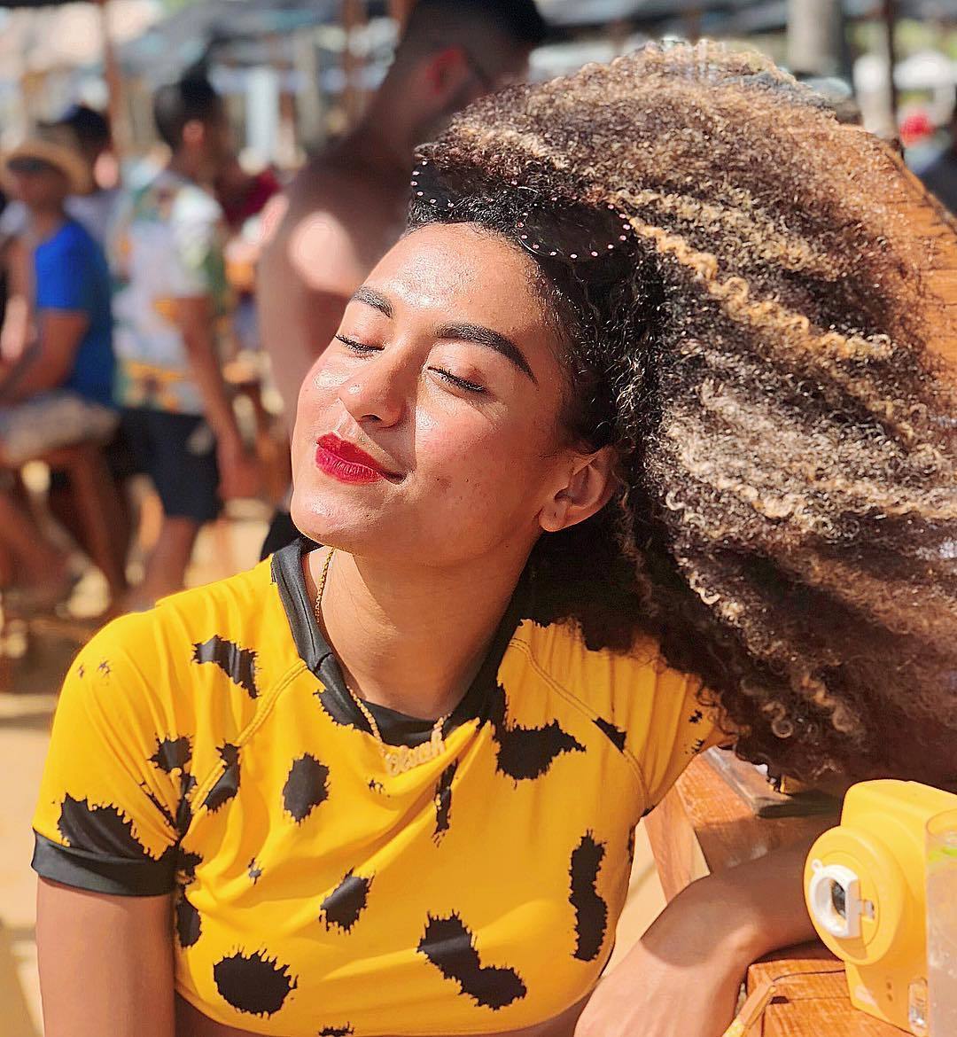 Olvah Alhamid Puteri Intelegensia dengan rambut keriting