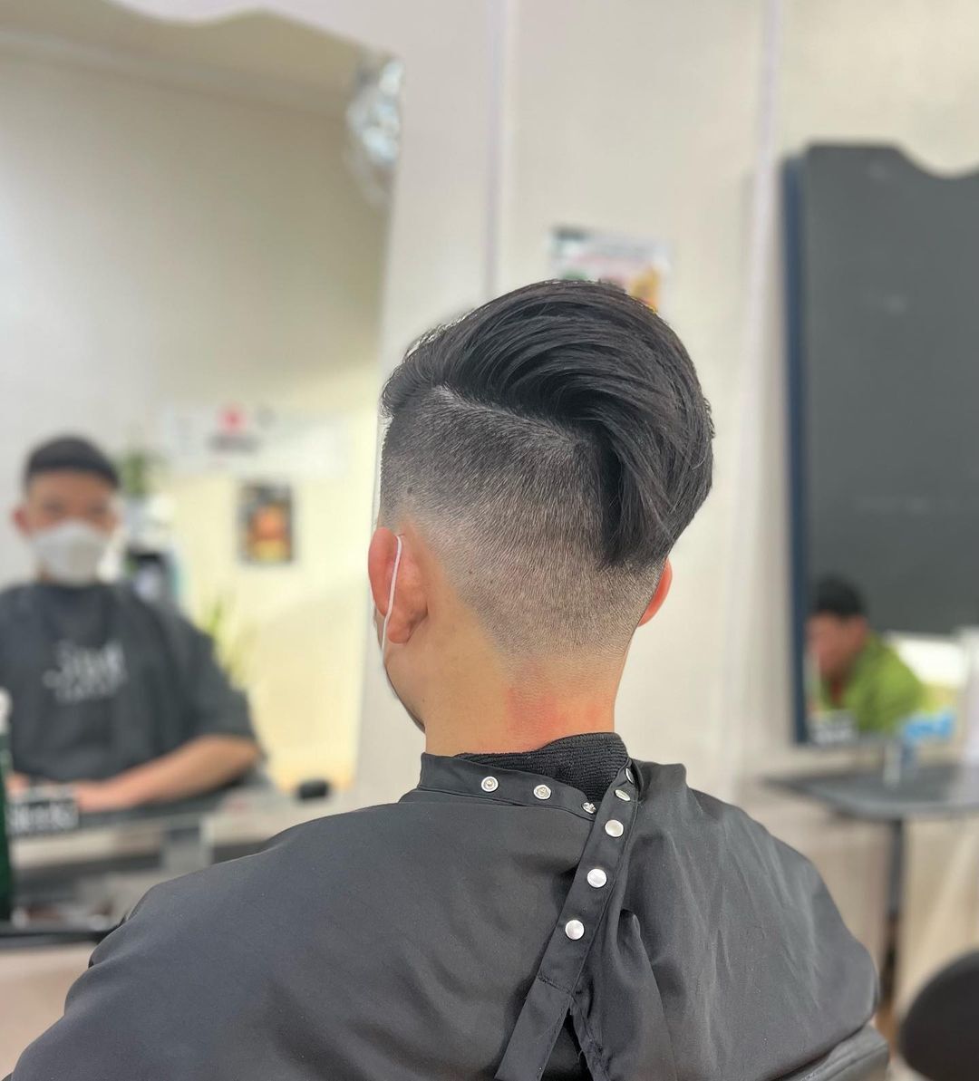 Model rambut disconnected undercut dari belakang. (Foto: Instagram/sleekihairstudio)