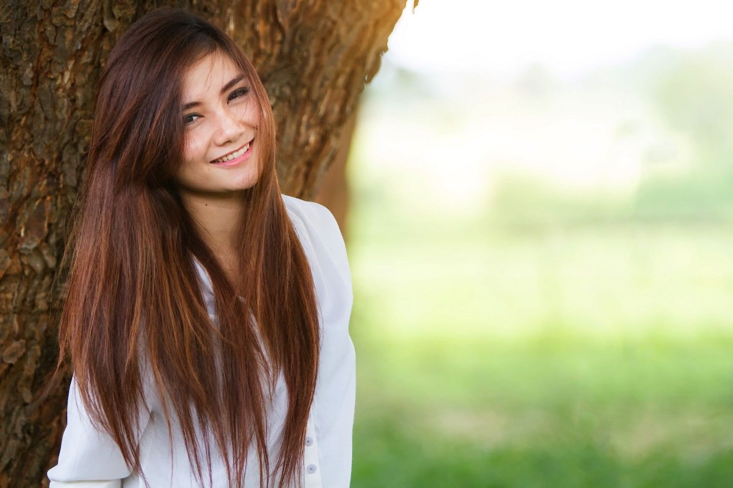 Punya wajah bulat? Coba model rambut panjang dengan poni yang sejajar dengan dagu. (Foto: Shutterstock)