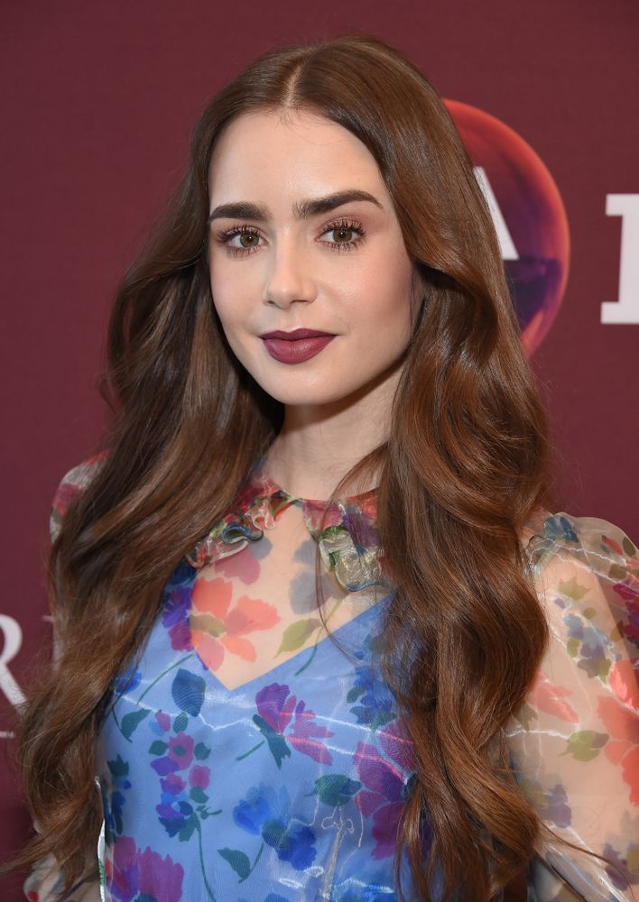 Lily Collins terlihat cantik dan elegan. (Foto: Shutterstock)
