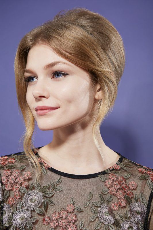 Wanita kaukasia dengan rambut disasak