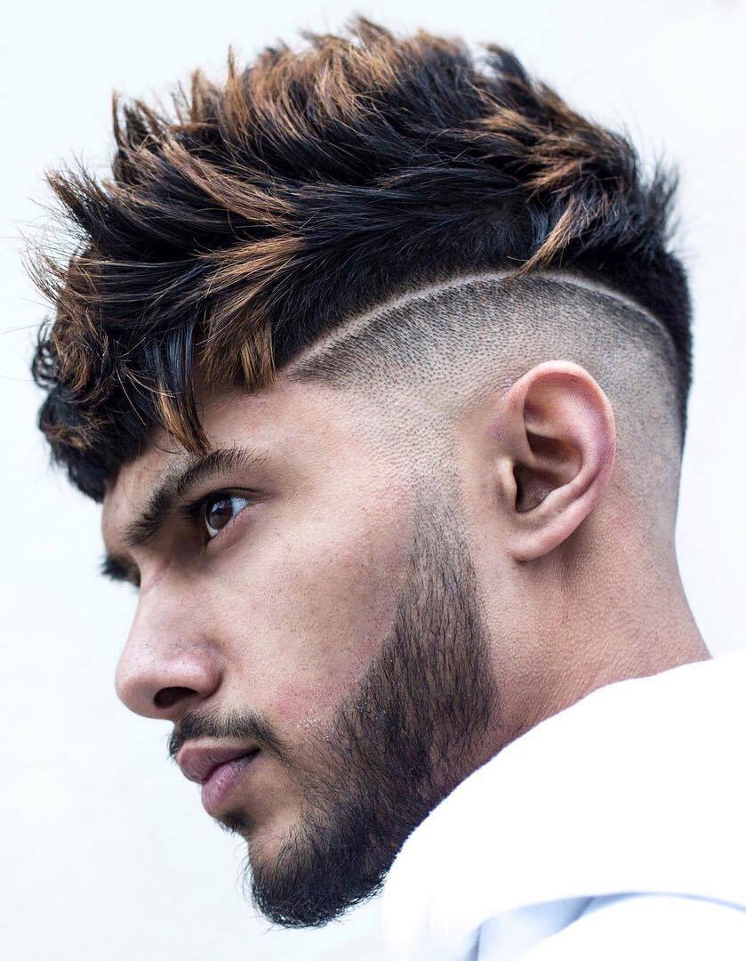 Sentuhan highlight warna cokelat terang bikin tampilan terlihat macho! (Foto: Haircutinspiration)