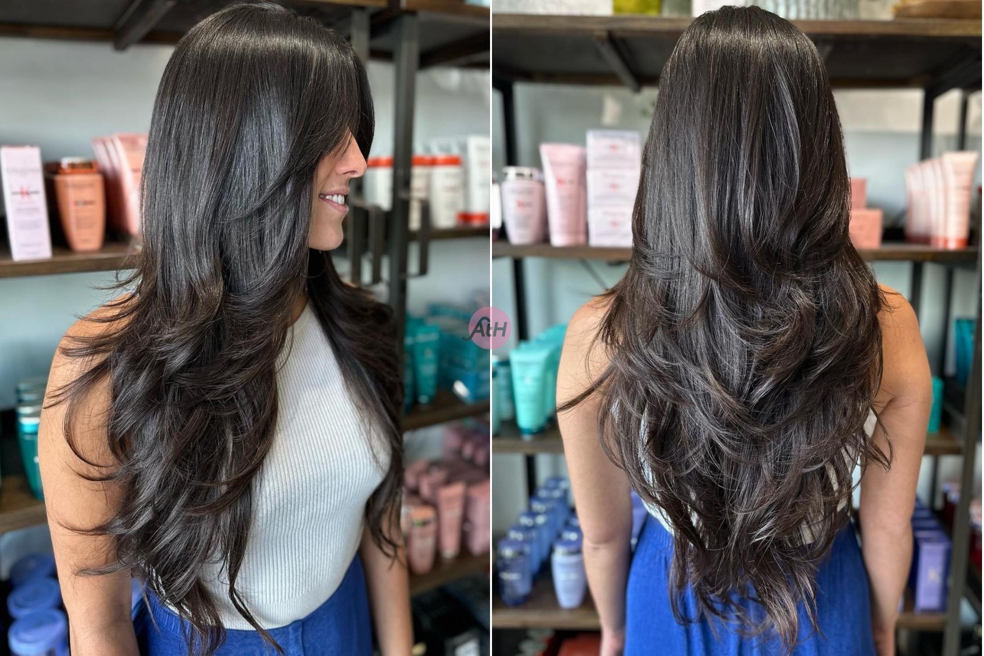 wanita dengan rambut gelap dan potongan layer panjang butterfly