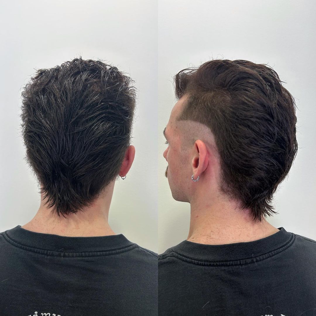 pria dengan gaya rambut faux hawk kombinasi mullet