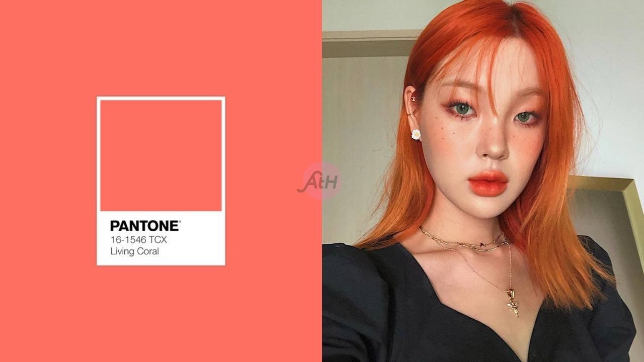 wanita asia dengan rambut warna oranye coral