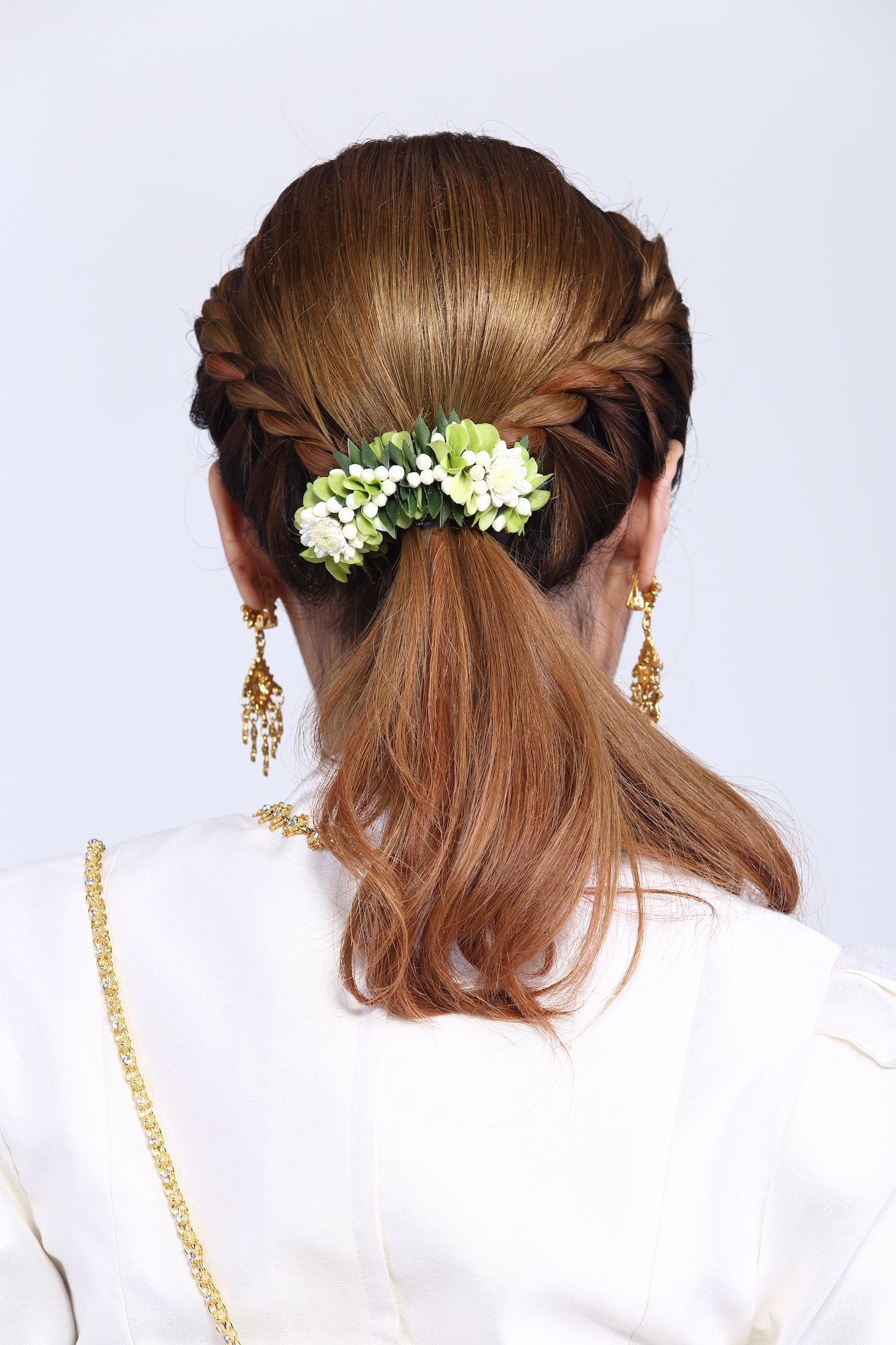 Gaya rambut ini bisa kamu coba untuk gaya rambut braided ponytail. (Foto: Shutterstock)