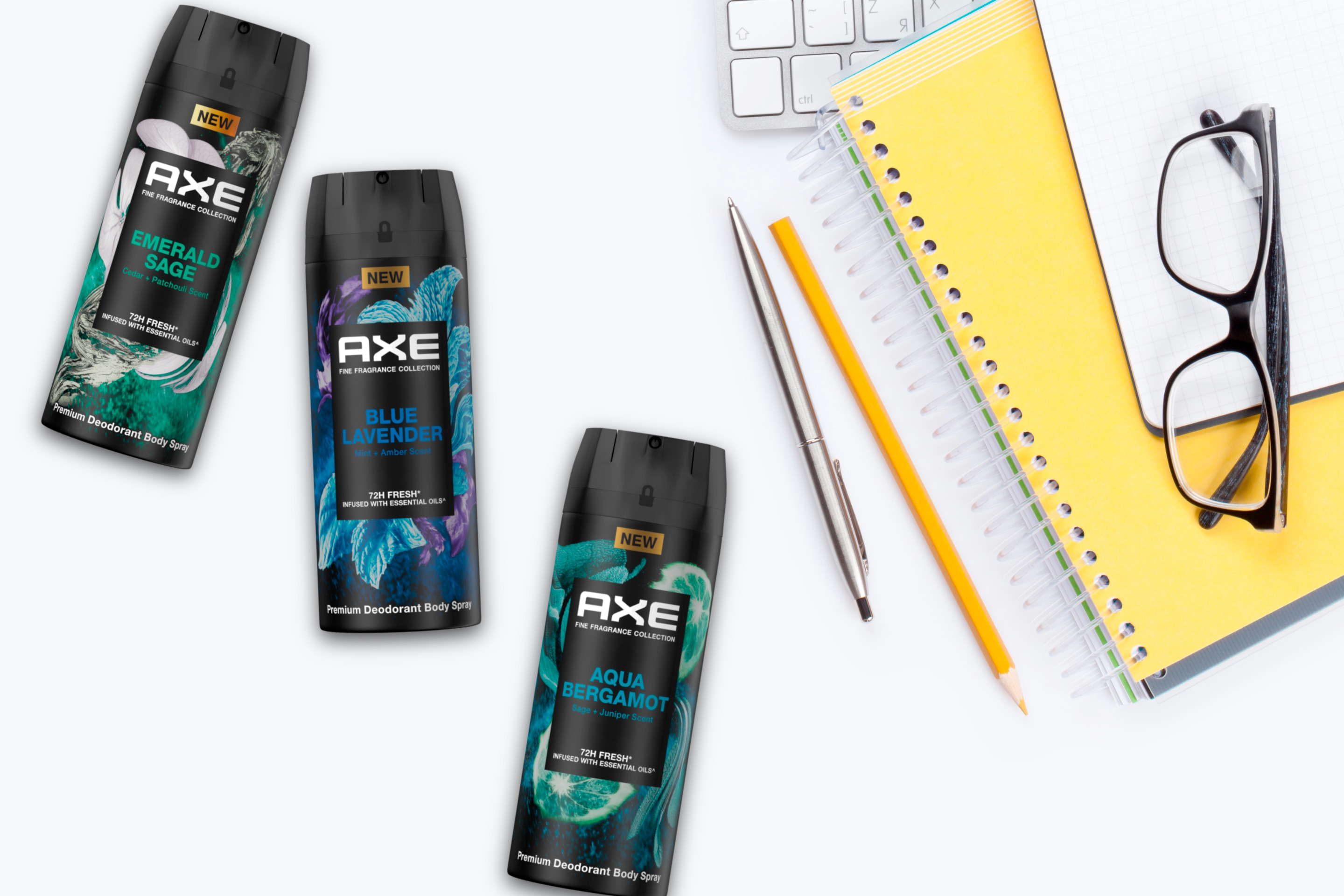parfum axe di antara buku dan peralatan menulis