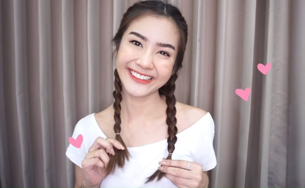 ผู้หญิงไทย จับเปียสองข้าง ทรงผมสงกรานต์