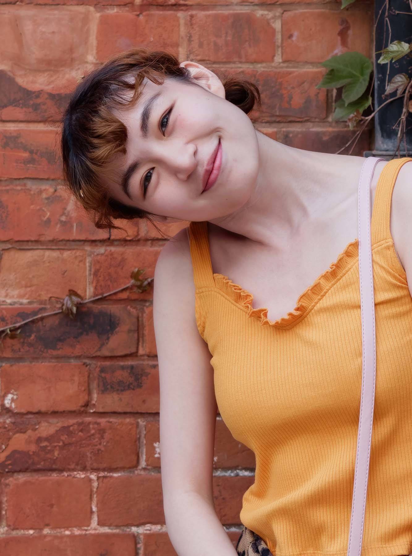 หน้าม้าดัดลอนน่ารักๆ (Credit: Rex by Shutterstock)