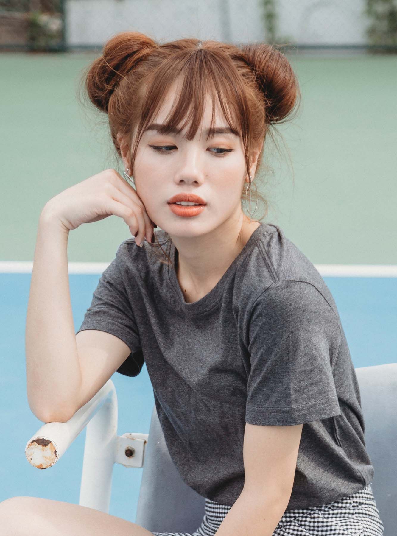 ผมหน้าม้ายาว กับทรงซาลาเปาสองข้าง (Credit: Rex by Shutterstock)