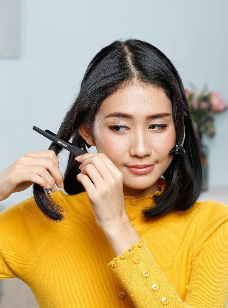 ผู้หญิงเอเชียผมสั้นถักเปีย