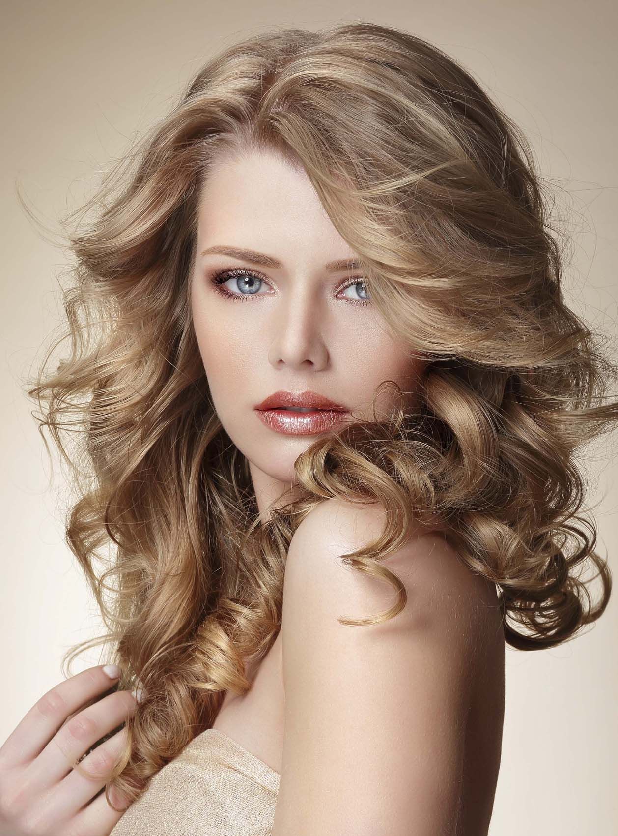 Sophisticated Woman with Perfect Skin and Flowing Blond Healthy Hair
