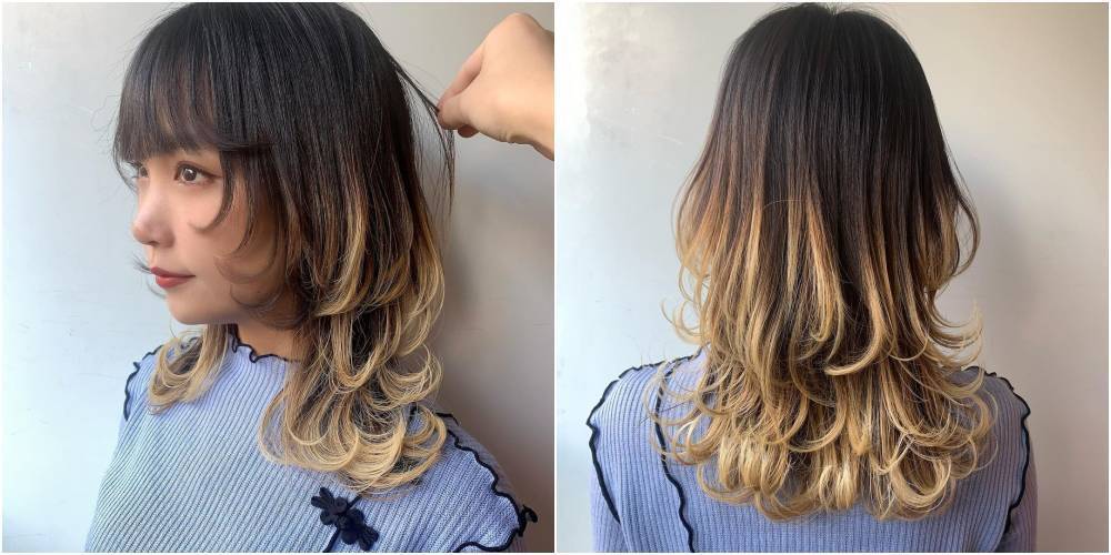 ผู้หญิงเอเชีย ไว้ผมยาวสีน้ำตาลเข้ม ทรงผมวูฟคัท