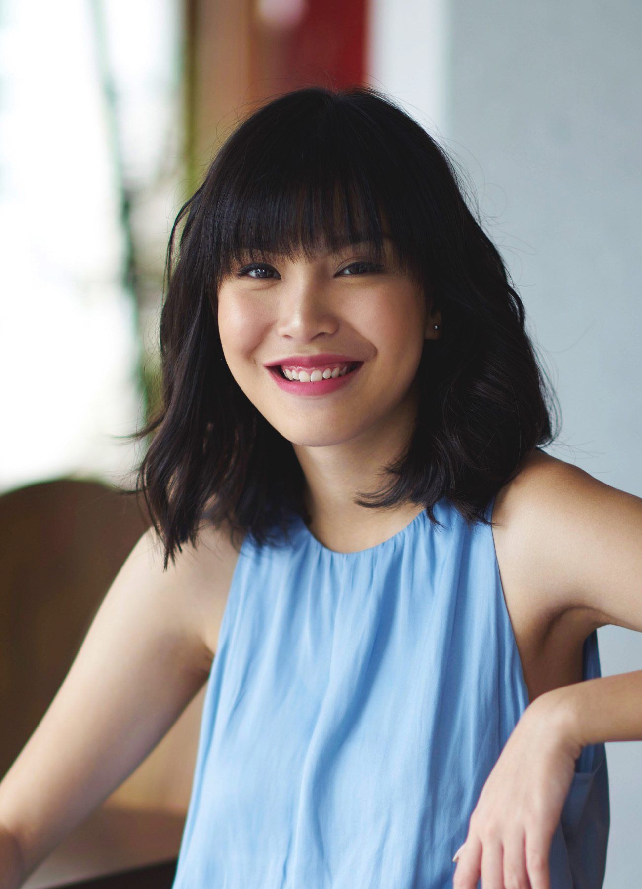 ผู้หญิงเอเชียผมสั้น ดัดผมบีชเวฟ หน้าม้ายาว