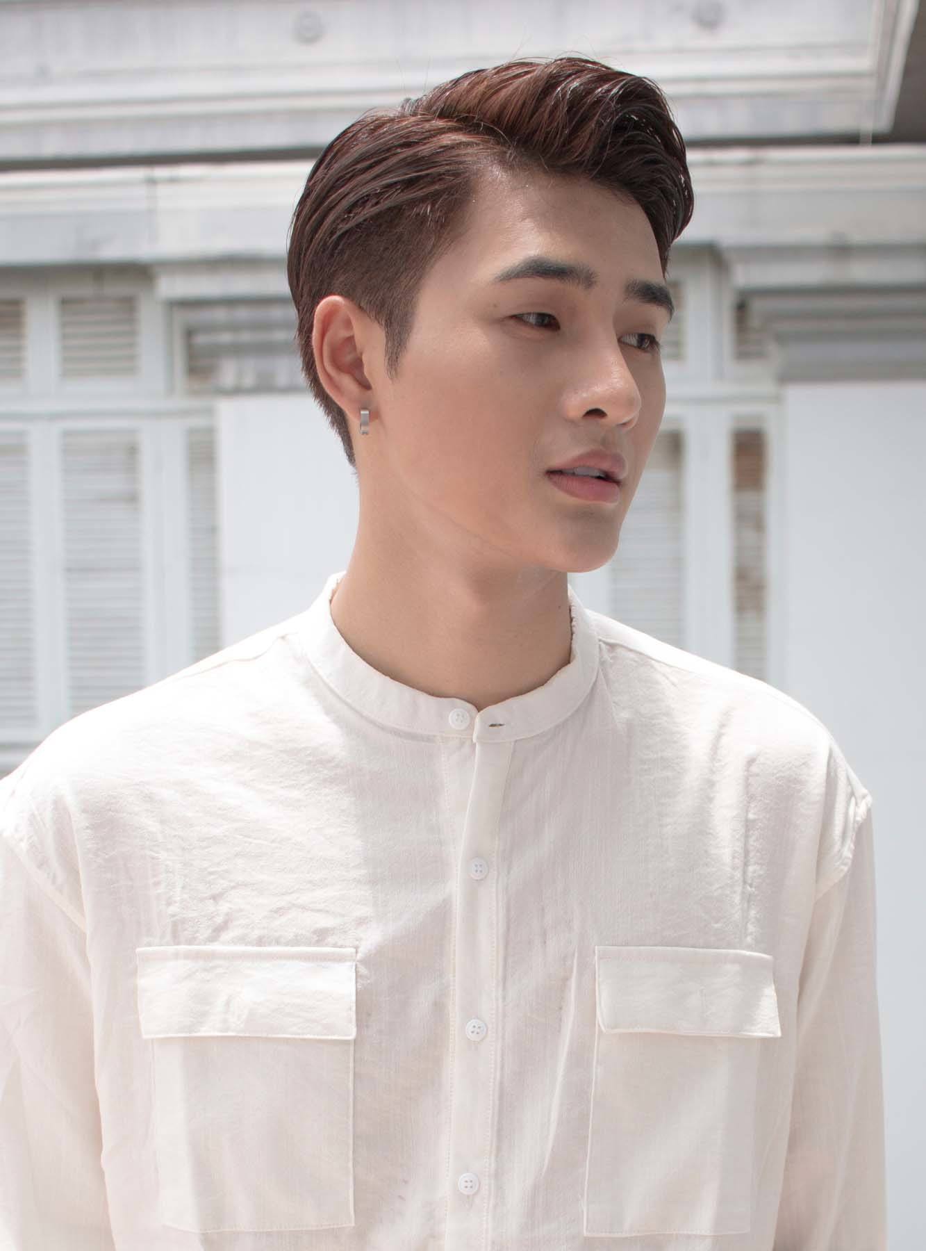 ผมแสกข้างเนี๊ยบๆ ดูน่าเชื่อถือ (Credit: Rex by Shutterstock)