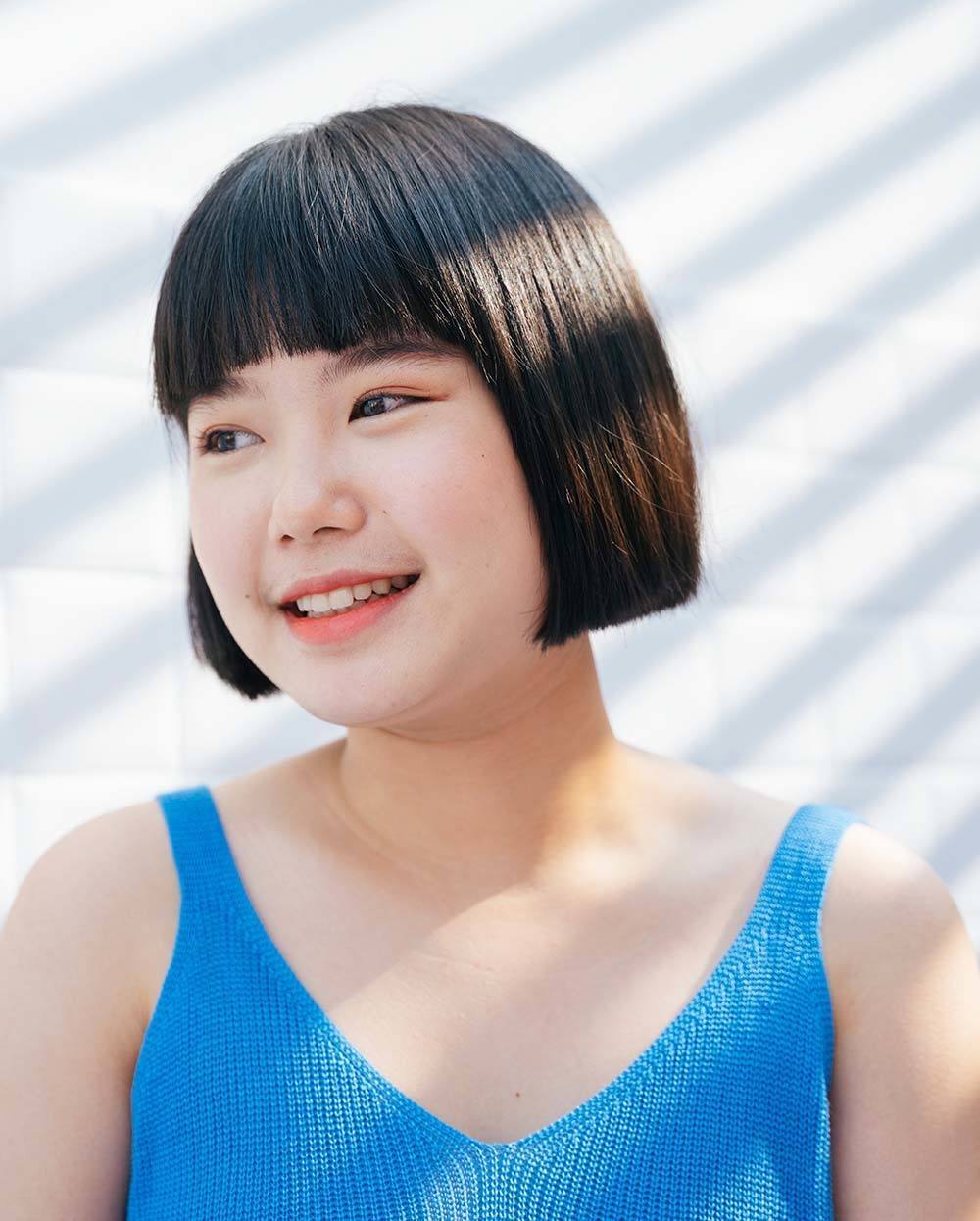 ผมบ๊อบสั้นหน้าม้า ทำให้ดูเด็กลง (Credit: Rex by Shutterstock)