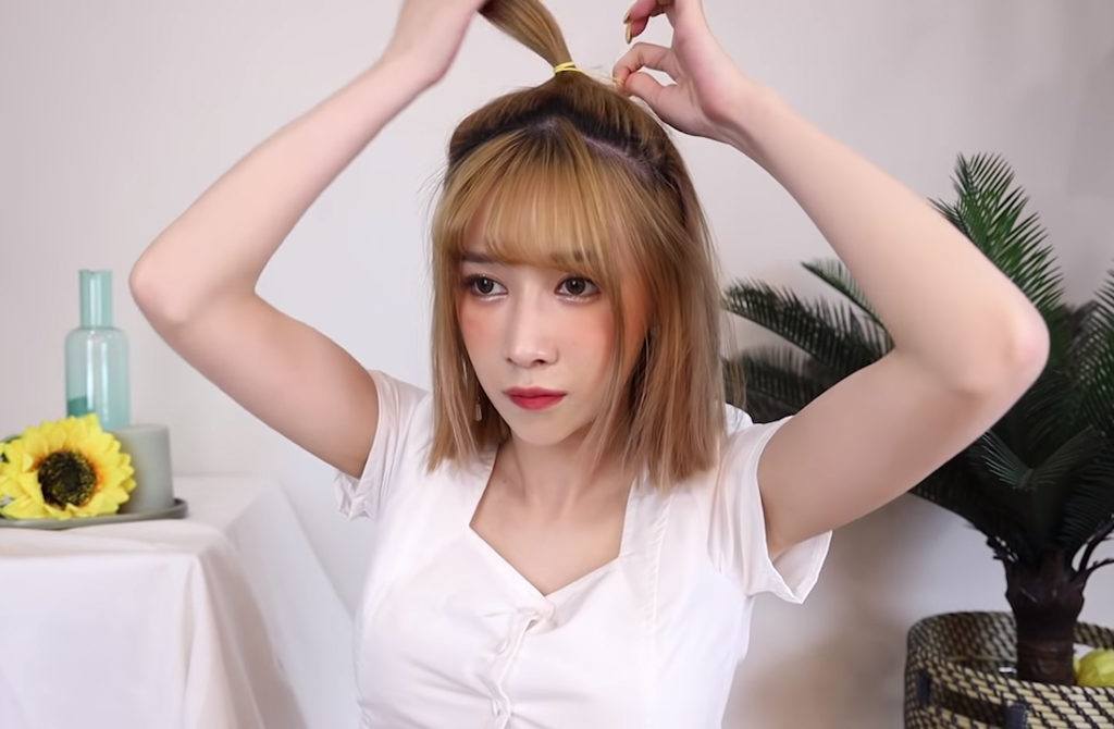 สาวไทย แบ่งผมด้านหลัง มัดผมช่อบน ทำทรงผมสั้นสไตล์เกาหลี