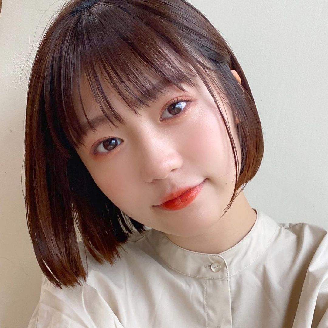  ผู้หญิงเอเชีย ตัดผมบ๊อบสั้น  หน้าม้าบาง 