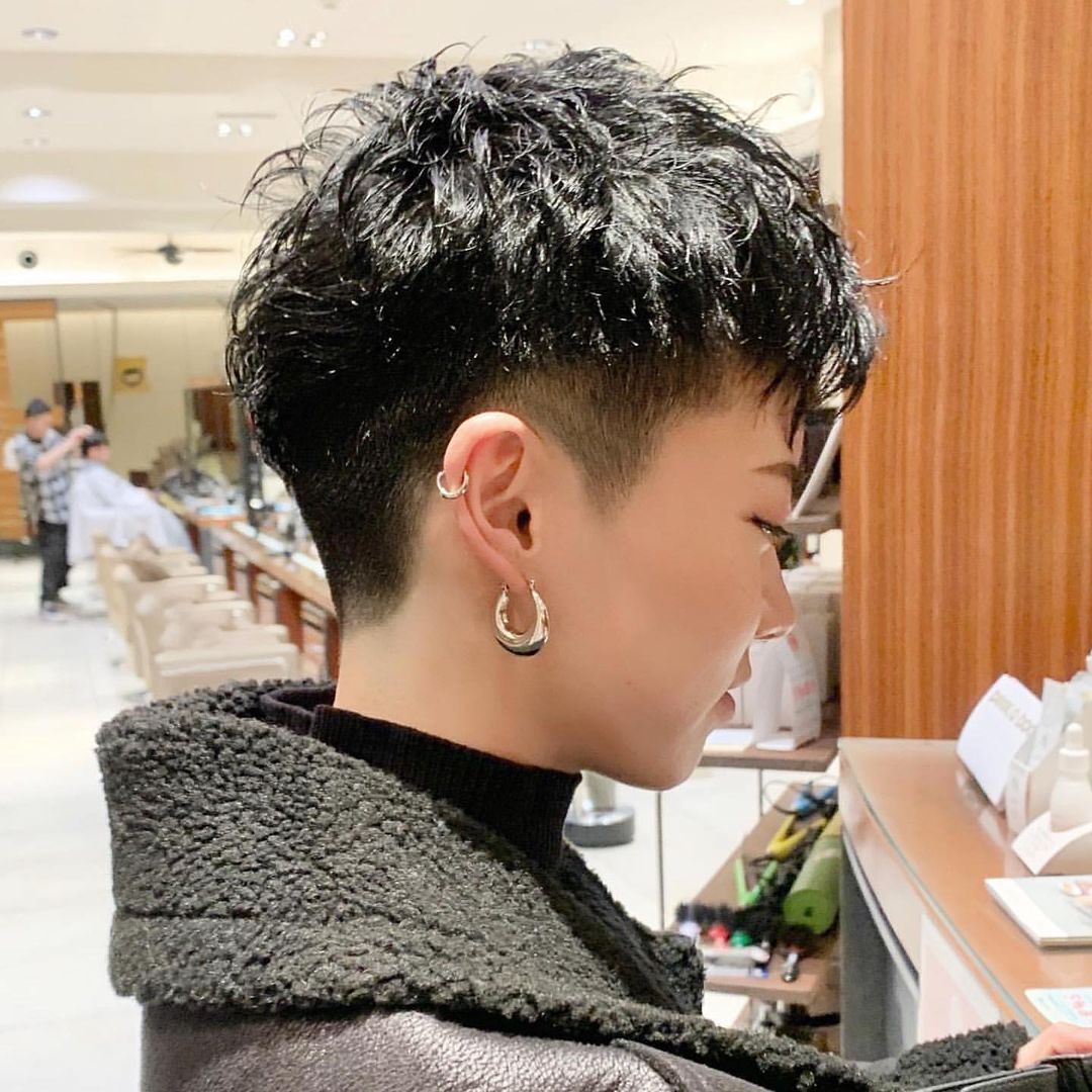 woman_short_permed_hair_pixie_under_Cut_Curls