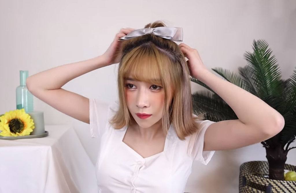 สาวไทย ติดโบว์ บนจุกมัดผม ทำทรงผมสั้น สไตล์เกาหลี