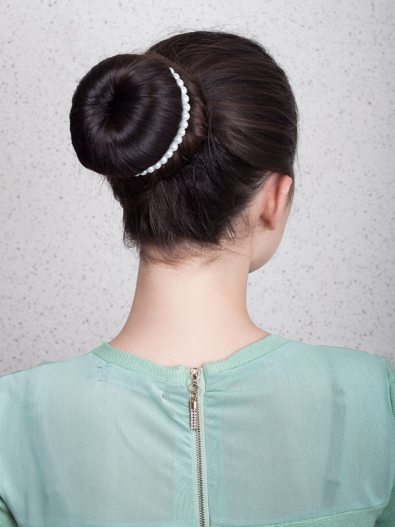 ทรงผมมัดมวย (Credit : Shutterstock)