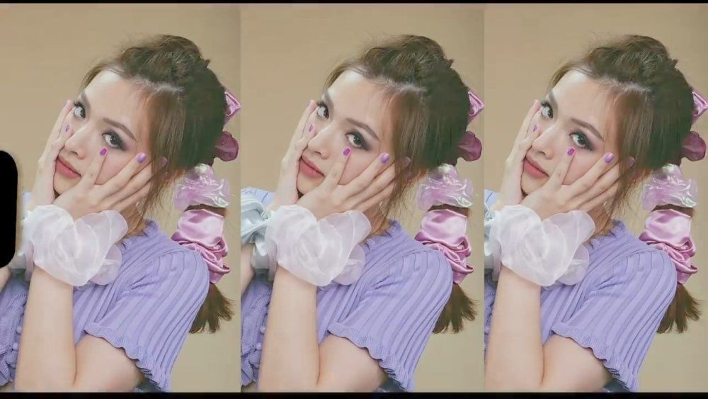 ผู้หญิงเอเชีย ไว้ผมยาวสีน้ำตาลเข้มถักเปีย โดยใช้ Jumbo Scrunchies