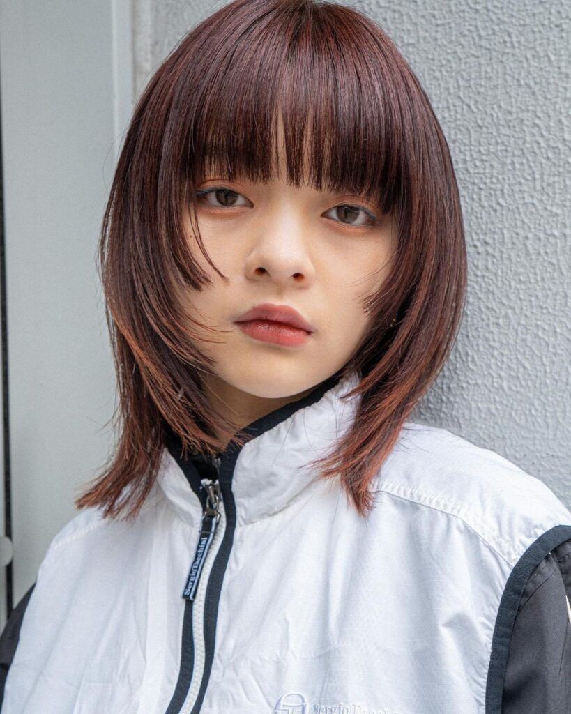 ผู้หญิงเอเชีย ผมยาวสีน้ำตาล ทรงผมคนหน้ากลม