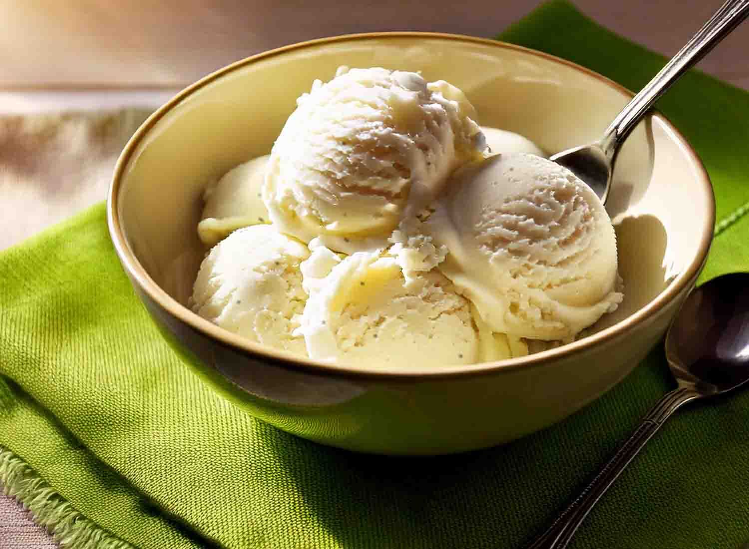 Scoops of vanilla ice cream in a bowl