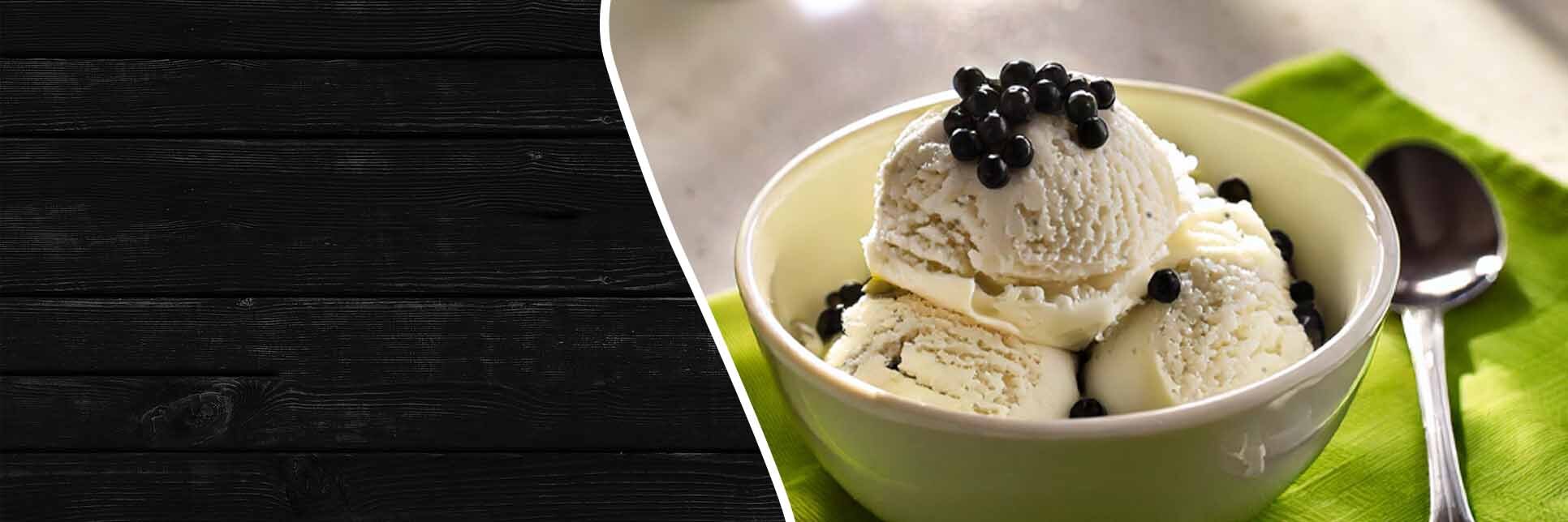 Scoops of Vanilla boba ice cream in a bowl topped with tapioca pearls