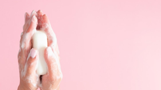 Close up of woman’s hands holding bar soap