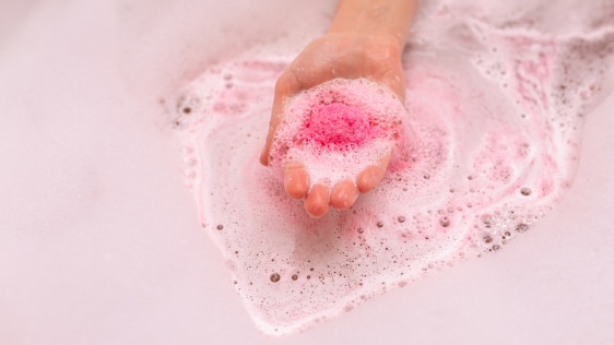Close-up of bath bomb that has not expired in a bathtub