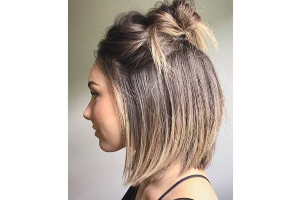 Classic 90s claw clip updo for long hair