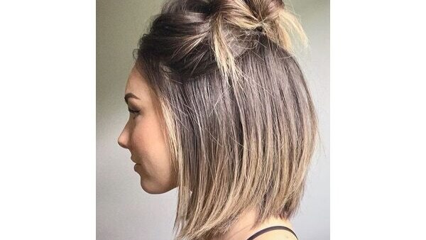 Classic 90s claw clip updo for long hair
