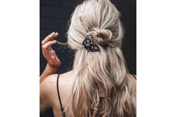 Classic 90s claw clip updo for long hair