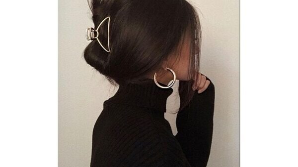 Classic 90s claw clip updo for long hair
