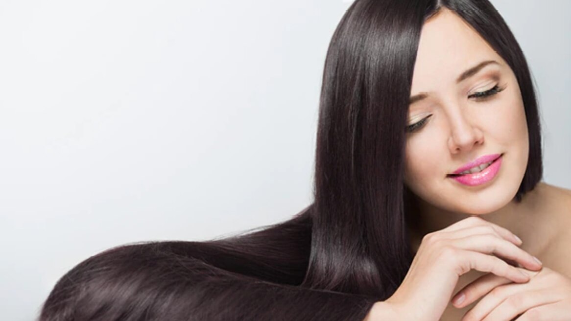 hot oil treatment for hair woman brunette