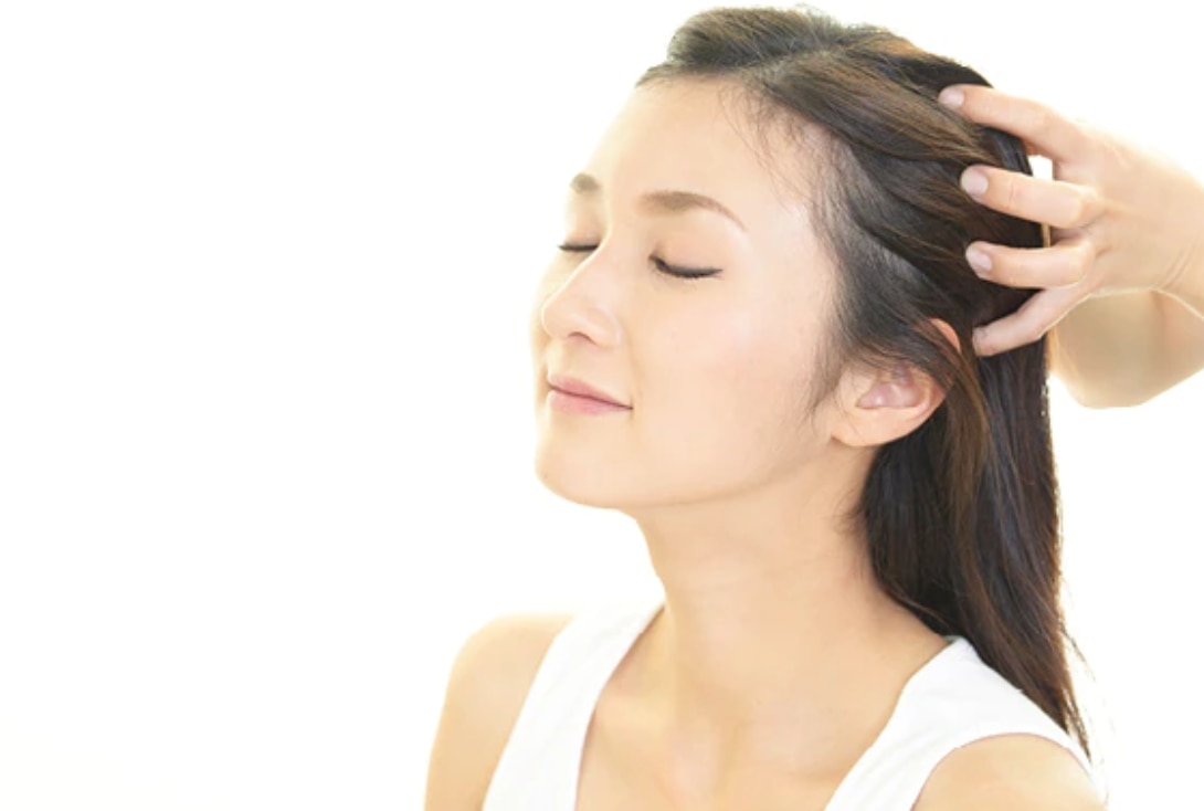 hot oil treatment for hair woman brunette